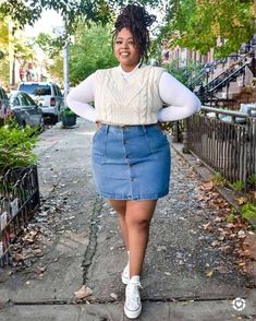 Beautiful Plus size black woman with sweater vest and cream turtleneck with a blue denim dress Denim Mini Skirt Outfit Fall, Plus Size Summer Outfits Casual, Size Aesthetic, Plus Size Aesthetic Outfits, 2024 Clothes, Plus Size Baddie Outfits, Work Fits, Plus Size Fall Outfit, Plus Size Fall Fashion