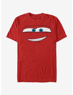 a red t - shirt with a face drawn on it