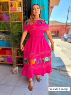 This Beautiful Floral embroidered Dress is the perfect dress to add to your wardrobe. The ruffle off the shoulder design combined with the bold florals give it that feminine touch. This dress is handmade and embroidered on Artisanal Machine by Mexican Artisans in Mexico. One size plus  is for 1X AND 2X Summer Peasant Style Pink Dress, Pink Peasant Dress For Summer, Peasant Style Pink Dress For Summer, Pink Short Sleeve Maxi Dress With Floral Embroidery, Pink Floral Embroidered Dress For Festival, Pink Floral Embroidered Festival Dress, Summer Pink Dress With Embroidered Neckline, Festival Short Sleeve Dress With Embroidered Border, Pink Embroidered Short Sleeve Maxi Dress