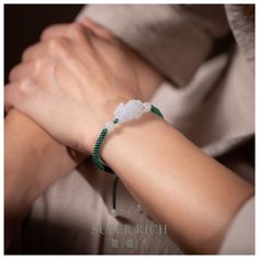 Elevate your aura with our Authentic Type A Jadeite Pixiu Bracelet 天然翡翠貔貅手链, a symbol of prosperity and spiritual guardian. Hand-carved with care, this jadeite piece serves as a potent Feng Shui amulet to attract wealth and repel negativity. Each bracelet comes with a gemological certificate, ensuring its pristine quality and authenticity. Join our circle of kindness:  with every purchase, we invite you to leave a review. For each one, we'll make a charitable donation. Item Details: *Item No.: SR-BAC-004 *Material: Certified Grade A Jadeite, 天然翡翠 *Jadeite Type: Type-A Jadeite, Untreated *Pixiu Charm Size: ±21.3mm x 11.8mm x 9.7mm *Beads Size: ±5.7-6.1mm *Cord: Adjustable, with a maximum diameter of 20cm, crafted from durable, vivid green string to fit all wrist sizes *Features: Hand-Carved White Spiritual Bracelet For Good Luck, Spiritual White Bracelet For Good Luck, Spiritual White Bracelets For Good Luck, Pixiu Bracelet, Feng Shui Wealth, Feng Shui Energy, Gift Love, Attract Wealth, Charm Bracelets