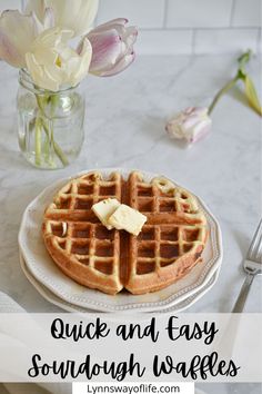 a waffle on a plate with butter and syrup in the background text reads quick and easy sourdough waffles