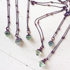 "A perfect piece to go with just about any outfit, this little copper electroformed top green fluorite quartz necklace features an octahedron shaped pendant and is suspended from a 19\" (48.26 cm) antiqued copper-plated satellite chain. The cutest little necklace that just may help increase inspiration and stimulate creativity as you wear it, this one will have you feeling pretty and wearing on repeat! - copper electroformed quartz pendant - pendant measures approx. 1\" (2.54 cm) including the c Vintaj Jewelry, Boho Jewels, Gem Pendant, Boho Hippie Style, Quartz Pendant Necklace, Feeling Pretty, Necklace Ideas, Green Fluorite, Jewellery Inspiration