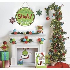 a christmas tree and presents in front of a fireplace with the words stay st nick on it