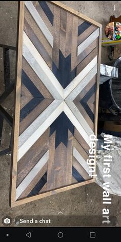 a wooden table with white and blue stripes on it