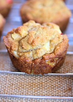 some muffins are sitting on a cooling rack