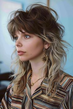 Bold Rock ‘n Roll shaggy mullet combining retro vibes with modern flair for 2024 Cool Shaggy Haircuts, Women’s Edgy Haircuts, Shag Inspired Haircut, Women’s Shag Mullet, Shaggy Haircuts Bangs, Halfway Hairstyles, Mullet Shag Women, Shag Haircut Color Ideas, Short Hair Shag With Bangs