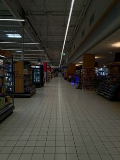 an empty grocery store filled with lots of food