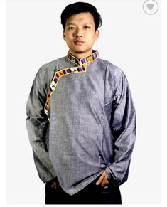 TRADITIONAL TIBETAN SHIRT  This unique style is derived from the clothing Tibetans usually wear to cultural events. 100% Cotton this unique shirt is loose and comfortable perfect for summer and spring.  Made by hand, this texture is coarser than normal cotton, however, customers have boasted about the durability of this shirt lasting them 20 years. Men and Women can both wear these incredibly light and soft shirts to break away from the tight clothing we are used to. Cotton is the perfect materi Traditional Cotton Top With Stand Collar, Casual Long Sleeve Top With Traditional Patterns, Traditional Long Sleeve Shirt With Patterns, Traditional Tops With Traditional Patterns For Festivals, Traditional Tops With Festive Patterns, Traditional Long Sleeve Shirt, Traditional Ceremonial Tops For Festivals, Traditional Long Sleeve Festival Shirt, Traditional Tops For Festivals And Ceremonies