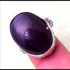 It Is Brand New And In Perfect Condition. Unique Silver Oval Amethyst Ring, Oval Silver Amethyst Ring Collectible, Silver Polished Amethyst Ring, Silver Amethyst Ring Collectible, Silver Amethyst Ring With Polished Finish, Sterling Silver Amethyst Ring With Cabochon, Silver Amethyst Collectible Ring, Black Enamel Onyx Round Rings, Silver Amethyst Cabochon Ring In Sterling Silver