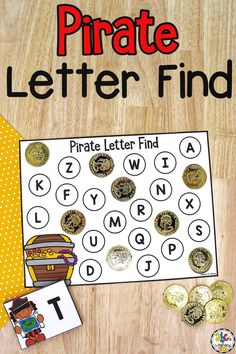 a pirate letter finder and some coins on a wooden table with the words pirate