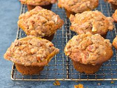 several muffins cooling on a wire rack