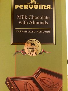 a box of milk chocolate with almonds and caramelized almonds on top