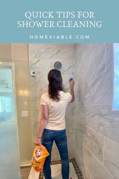 a woman is using a shower cleaner to clean the walls in her bathroom, with text overlay that reads quick tips for shower cleaning