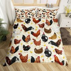 a bed with chickens and roosters on it