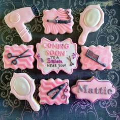 decorated cookies with pink and white icing that say coming soon to a hair stylist near you