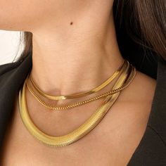 This necklace is a trendy addition to any look. The Dainty Flat Snake Necklace features a unique flat snake design. A delicate, wearable snake for your everyday look. Stack to make a statement. This necklace can be adjusted to be worn as either a choker or a longer necklace. Product DetailsMetal: 18K Gold Plated BrassLength: 36cmExtender: 9cmWidth: 0.4cmWeight: 7gLobster Clasp Fastening Snake Choker Necklace, Necklace Product, Stacked Necklaces, Extraordinary Women, Snake Necklace, Gold Flats, Snake Design, Gold Choker Necklace, Gold Choker