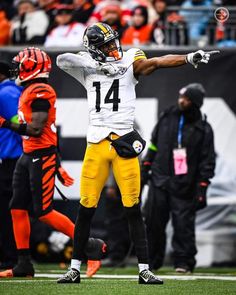 a football player throwing a ball in the air