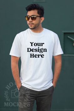 Our White Gildan 64000 Mockup features a male model wearing the white unisex tshirt as part of our Minimalist Mockup Collection. The aesthetic mockup is ideal for use by t-shirt designers, print on demand stores or anyone who wants to showcase their designs to stand out from the competition!  All of our mockups are high quality photos of the actual shirts - no color overlays. We specialize in male model mockups focusing on Gildan 18000 sweatshirt mockups, Gildan 18500 hoodie mockups, and Gildan 64000 t-shirt mockups and Bella Canvas 3001 tshirt mockups.  MOCKUP INFORMATION  *This mockup is of the Gildan 64000 T-shirt *You will instantly receive 2 high resolution digital jpg images free of branding *One image is 2700 pixels wide x 2025 pixels tall and one image is 2000 pixels wide x 3000 pi Customizable White T-shirt For Streetwear, Customizable Basic White T-shirt, Customizable White Streetwear T-shirt, White Crew Neck T-shirt With Branding, Aesthetic Mockup, Hoodie Mockup, Clothing Mockup, Green Hoodie, Tshirt Mockup