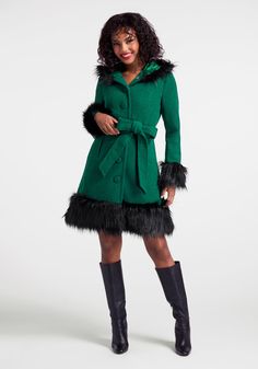 In deep emerald green hue, this wonderful hooded coat from our ModCloth namesake label is fully-lined and made from mid-weight, wool-blend fabric that will keep out the cold ! Boasting long sleeves, a generous hood, button front closure, a removable and matching tie-waist belt, and handy side pockets, this stylish fit-and-flare coat finishes below the knee. Trimmed in black faux-fur at the cuffs, hood, and hemline, this whimsically festive, retro-chic coat is an ensemble unto itself ! 50% Wool, Fit And Flare Coat, Designer Plus Size Clothing, Faux Fur Trim Coat, Coat Check, Deep Emerald Green, Mix Match Outfits, Christmas Outfits Women, Chic Coat, Trench Coat Style