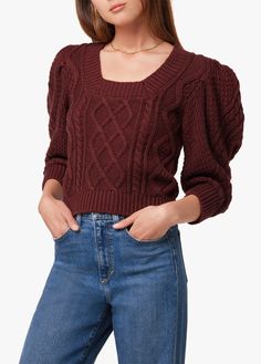 The classic cable knit, updated with a feminine touch. The super soft Ara sweater has modern styling thanks to folded sleeves that give some puff styling to the shoulders. With a tapered silhouette and a squared neckline, this sweater will pair well with high rise denim or layer it on top of the Maxine skirt for a fresh fall look. 
56% Cotton, 33% Nylon, 11% WoolMODEL IS WEARING SIZE SMALL Marlene Mckinnon, Teacher Attire, Folded Sleeves, Studded Sweater, Squared Neckline, Burgundy Jeans, Dream Outfits, Puff Sleeve Sweater, Boxy Sweater