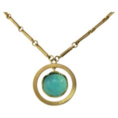 Vintage 18 Karat Yellow Gold Tourmaline Pendant Necklace- This stunning pendant necklace features one blue/green tourmaline stone (11 mm) set in beautifully detailed 18K yellow gold. Size: 15 inches (necklace) 20 mm (pendant) Stamped: 18K Weight: 14.7 gr./ 9.4 dwt. Very good condition, professionally polished. Will come packaged in a gift box or pouch (when possible) and will be shipped U.S. Priority Mail Insured. DV102923/17KCS JAGI ID 10/17/23 Tourmaline Pendant, Tourmaline Stone, Green Tourmaline, Chains Jewelry, Estate Jewelry, Blue Gold, Womens Jewelry Necklace, Favorite Jewelry, Tourmaline