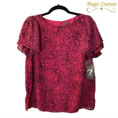 Nwt Vince Camuto Pomegranate Pink Flutter Sleeve Top Size Small. Bright Pink Top With Black Cheetah Style Print On Crepe Fabric: Short Flutter Sleeves. Keyhole Back. Fully Lined. Condition Is Brand New With Tags! Make An Offer! Chest 36” Sleeve Length 8” Length 24” 100% Polyester Pink Fitted Blouse With Flutter Sleeves, Cheetah Style, Flutter Sleeve Top, Pink Top, Crepe Fabric, Flutter Sleeves, Pink Tops, Flutter Sleeve, Vince Camuto