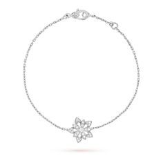 Van Cleef & Arpels - Lotus openwork bracelet mini model - Bracelet Woman White gold/Diamond - A symbol of beauty, purity and fulfillment, the lotus flower has inspired Van Cleef & Arpels to create dazzling and harmonious jewelry creations. Different types of diamond setting showcase the Maison's High Jewelry expertise. Lotus openwork bracelet, mini model,  rhodium plated 18K white gold, diamonds Lotus Bracelet, Van Cleef And Arpels Jewelry, Van Cleef & Arpels, Hamsa Bracelet, Gold Bridesmaids, Mini Model, Types Of Diamonds, The Lotus, Van Cleef Arpels