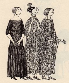 three women in dresses standing next to each other