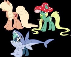 four different colored ponies standing next to each other in front of a black background