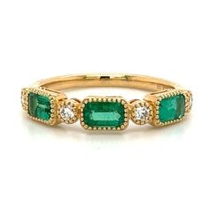 This emerald and diamond celebration stackable ring will give you something to celebrate! Fabulous emerald and diamond accents shimmer and sparkle against the yellow gold setting, all combined into one timeless piece. Show off your own unique style with this glorious piece!Metal: 18K Yellow GoldDiamond Details: 4 Round Diamonds 0.14ct twGemstone Details: 3 Emerald 0.83ct tw Sizable, For desired ring size please leave us a note at the check out. Yellow Gold Setting, Stackable Ring, Emerald Ring, Stackable Rings, Timeless Pieces, Round Diamonds, Unique Style, Emerald, Ring Size