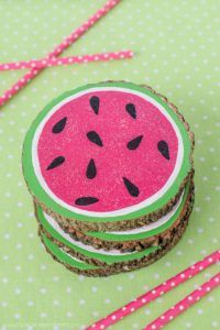 there is a piece of cake that looks like a watermelon on the table