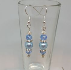 "Blue Pearl Drop Earrings, Wedding Earrings Fashion earrings made with flair and finesse. They are very lightweight, hypoallergenic, and catch the eye easily. The photos just do not do them justice! They measure 1 1/2\" inches from the top of the hook to the bottom metal dangle bead. Get something blue for your wedding jewelry in these authentic look blue pearl earrings that are simply elegant. They make unique gifts for any occasion and are perfect Mothers Day Jewelry as well. So whether you ar Classic Blue Pearl Earrings For Wedding, Blue Hypoallergenic Earrings For Formal Occasions, Elegant Hypoallergenic Adjustable Crystal Earrings, Nickel-free Blue Earrings For Wedding, Pearl Drop Earrings Wedding, Blue Pearl Earrings, Drop Earrings Wedding, Mothers Day Jewelry, Gold Mermaid