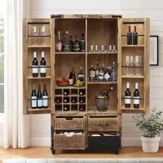 an old wooden cabinet filled with bottles and glasses