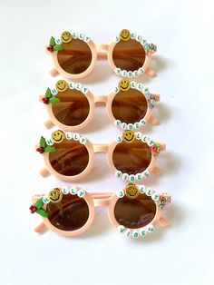 "CHRISTMAS SUNNIES!! These are so adorable-- Each pair is handcrafted by me. Using various beads, Charms, Rhinestones, and fun details!  \"HOLLY JOLLY VIBES\" * Anti-Glare * UV Protection (UVA & UVB) * Durable and shatterproof  * They open and close smoothly  * Each item is made to order and will be ready to ship in 5-7 business days! If you need your order sooner. Please check out my \"RUSH ORDER OPTION\".  https://www.etsy.com/EyeCandyandFluff/listing/1286351273/rush-my-order-please *SHOP DISCLAIMER/WAIVER!  * Do NOT let your child put the sunglasses in their mouth as beads can become detached.    Always monitor and supervise while children are wearing these. The shop assumes no responsibility for sunglasses made. Sizing--fits ages recommended 2-12 years.  If you need to make a large ord Cute Customizable Sunglasses For Gift, Fun Sunglasses With Uv Protection For Gift, Fun Sunglasses With Gradient Lenses For Gift, Fun Sunglasses With Uv Protection As Gift, Adjustable Sunglasses With Gradient Lenses As Gift, Cute White Sunglasses For Gift, Cute White Sunglasses As Gift, Cute White Sunglasses As A Gift, Fun Handmade Sunglasses As A Gift