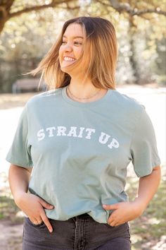 You don't even need to be an Aggie to love this shirt! Whether you are shopping for an Aggie friend who may not be an Aggie themselves or even yourself, this mint green tee in support of the country music legend George Strait is perfect for anyone! This tee features the phrase "Strait Up" in a rustic white font across the front so you can show your support loud and proud! Green Tee, George Strait, Green T Shirt, Rustic White, Mint Color