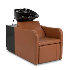 a brown chair with a black object on top of it