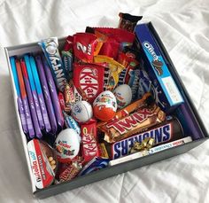 a box filled with lots of different types of candy