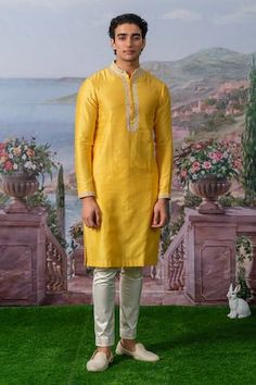 Yellow kurta with scattered embroidery and floral embroidered placket using zardozi, silk thread, pearl, sequin. Paired with a white pant. - Aza Fashions Wedding Kurta, Yellow Kurta, White Pant, Men Kurta, Kurta With Pants, Silk Thread, White Pants, Aza Fashion, Full Sleeve