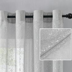 white curtains with silver glitter on them