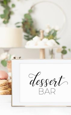 a dessert bar sign sitting on top of a table