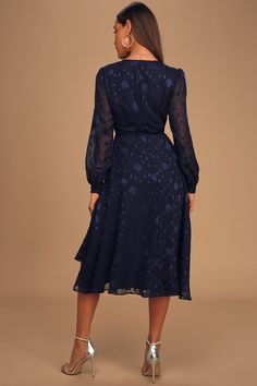 Classy and chic come together in perfect harmony to create the Lulus Evening of Elegance Navy Blue Floral Jacquard Wrap Midi Dress! Lightweight woven fabric, with a floral jacquard pattern, shapes this fabulous dress that has a surplice neckline and sheer long sleeves with button cuffs. Adjustable wrap silhouette, with tying waist sash and hidden internal ties, ends at a slightly ruffled midi hem. Fit: This garment fits true to size. Length: Mid-calf length. Size medium measures 47" from shoulde Elegant Knee-length Jacquard Dresses, Elegant Jacquard Midi Dress, Elegant Jacquard Midi Dress For Formal Events, Elegant Formal Jacquard Midi Dress, Elegant Spring Jacquard Midi Dress, Elegant Jacquard Midi Dress For Spring, Chic Jacquard Dresses For Weddings, Chic Jacquard Dress For Formal Occasions, Chic Fitted Jacquard Dress