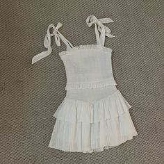 Bought From Dear Hannah Prep Brand Katie J Size S (Teens) Nwt Never Worn Dear Hannah Prep, White Tiered Skirt Mini Dress For Summer, White Tiered Sundress Mini Dress, White Tiered Skirt Sundress, White Tiered Tops For Summer, White Tiered Summer Top, Casual White Mini Dress With Ruffled Skirt, White Ruffled Mini Dress For Vacation, White Tiered Top With Ruffle Hem