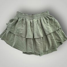 New With Original Tags Color Green Super Comfortable Size Large Casual Tiered Ruffle Skirt, Casual Ruffled Tiered Skirt, Casual Ruffled Skort For Vacation, Casual Cotton Ruffled Skort, Casual Cotton Ruffle Skort, Casual Ruffled Skirt For Vacation, Casual Green Skort For Vacation, Casual Solid Skort With Ruffled Skirt, Casual Ruffled Skirted Skort