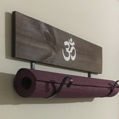 a yoga mat is hanging on the wall