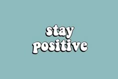 the words stay positive are in white letters on a blue background with black and white lettering