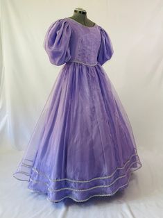 Purple Fitted Floor-length Ball Gown, Purple Fitted Ball Gown For Debutante Ball, Fitted Lavender Floor-length Ball Gown, Lavender Floor-length Ball Gown For Debutante Ball, Princess Style Purple Ball Gown, Formal Fitted Purple Ball Gown, Fitted Purple Ball Gown For Formal Occasions, Purple Dress With Fitted Bodice For Debutante Ball, Purple Short Sleeve Wedding Dress