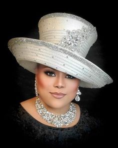 The SPT-301 hat features a classic design crafted from ivory and silver, and is adorned with a large rhinestone applique and further embellished with stones all over the hat. The perfect complement to an evening ensemble, this luxurious piece brings sophistication and glamor with a timeless look. 7 to 10 business day t Church Suits And Hats, Church Lady Hats, Dressy Hats, Church Suits, Elegant Hats, Fashion Closet, Rhinestone Appliques, Church Hats, Blue Hat