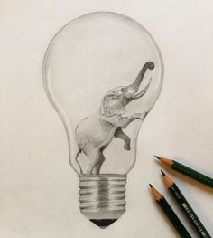 pencil drawing of an elephant inside a light bulb