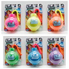 four different styles of small toys in plastic packaging with tags attached to each one's handles