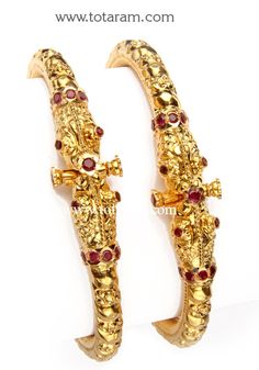 22 Karat Fine Gold Kada with Ruby - Set of 2 (1 Pair).
     Note: This item comes with a Screw and hinge so that you can open it up for easy wearing.            
 - 235-GK321 - in 30.650 Grams for USD $2519.79. 
Made in India by Totaram Jewelers Online this product is in Gold - 22 Karat BIS Hallmark 916 KDM Gold  & is an excellent gift for Adult - Women. Ships fully insured with secured guaranteed delivery for free with your order over $250 from New Jersey USA & comes with 30 days exchan Gold Kada, 22k Gold Bangles, Indian Gold Jewelry, Ruby Set, Gold Bangles For Women, 22k Gold Jewelry, Gold Jewelry Stores, Jeweled Earrings, Women Watches